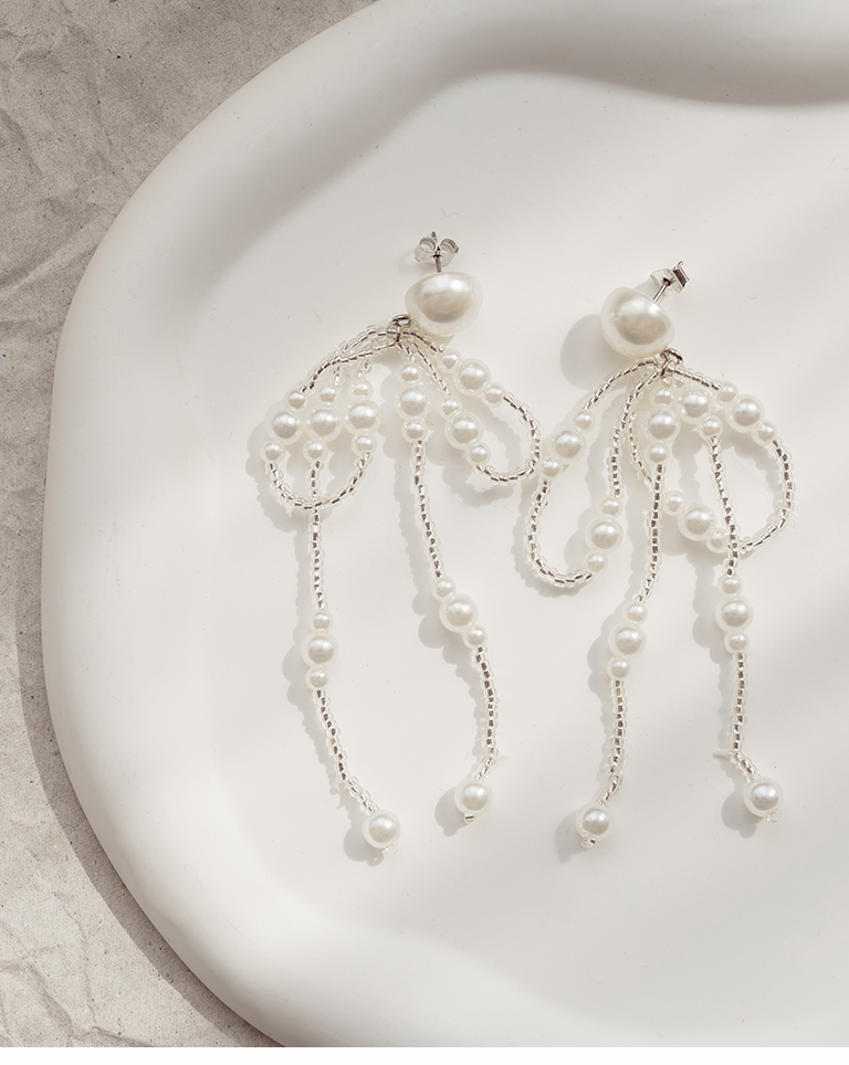 韓国人気【MONDAY EDITION】Pearl Pull Bow Earrings☆追跡付 TIE THE RIBBON - MONDAY EDITION